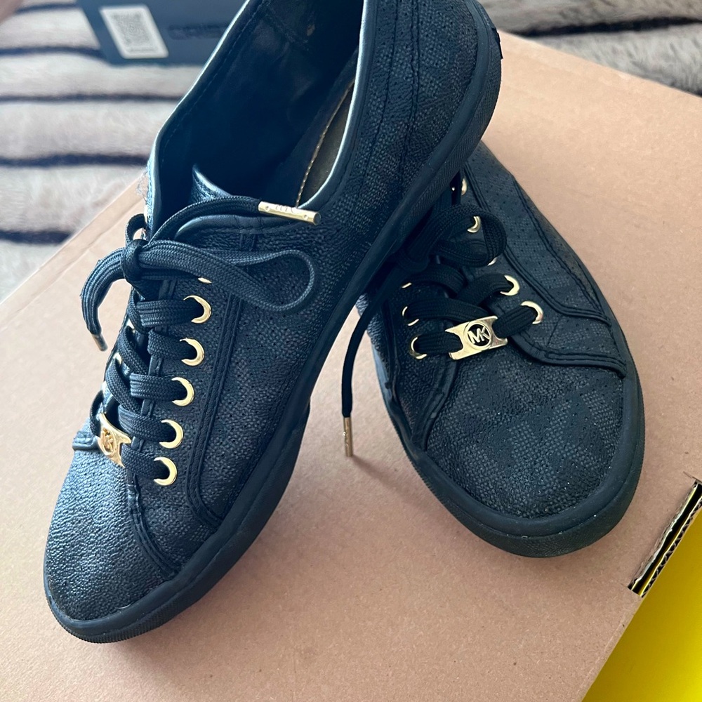 Black Michael Kors monogrammed sneakers
